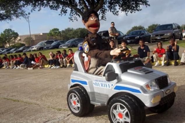 Puppet driving SUV
